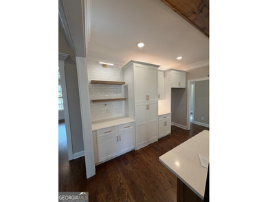 This custom home by Shockley Homes will check all your wants and on Oak Mountain Championship Golf Club in Georgia - for sale on GolfHomes.com, golf home, golf lot