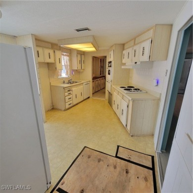 A little TLC could go along way here. Over 1300 sqft of living on Six Lakes Country Club in Florida - for sale on GolfHomes.com, golf home, golf lot