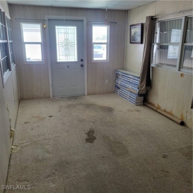 A little TLC could go along way here. Over 1300 sqft of living on Six Lakes Country Club in Florida - for sale on GolfHomes.com, golf home, golf lot