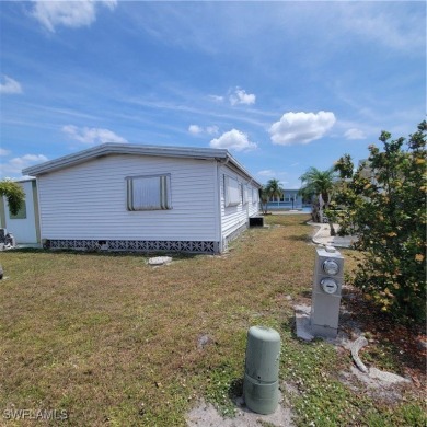 A little TLC could go along way here. Over 1300 sqft of living on Six Lakes Country Club in Florida - for sale on GolfHomes.com, golf home, golf lot