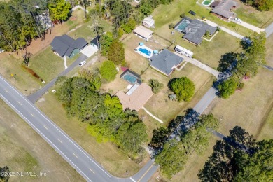 This charming 3-bedroom, 2-bath home located in the Starke Golf on Starke Golf and Country Club in Florida - for sale on GolfHomes.com, golf home, golf lot