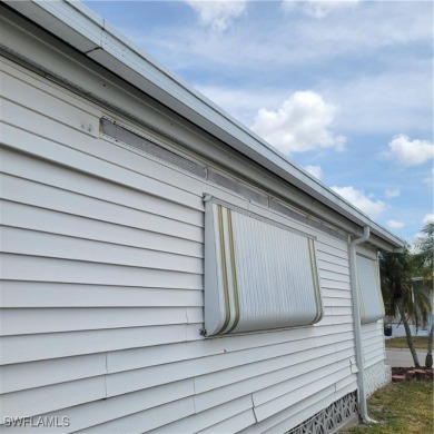 A little TLC could go along way here. Over 1300 sqft of living on Six Lakes Country Club in Florida - for sale on GolfHomes.com, golf home, golf lot
