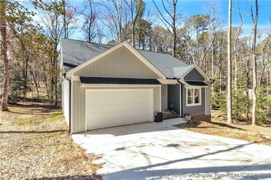 Welcome to 1534 Delaware Place! This incredible single-story on Carolina Trace Country Club in North Carolina - for sale on GolfHomes.com, golf home, golf lot