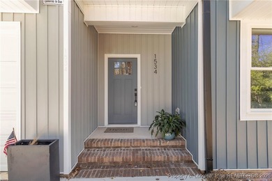 Welcome to 1534 Delaware Place! This incredible single-story on Carolina Trace Country Club in North Carolina - for sale on GolfHomes.com, golf home, golf lot