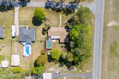 This charming 3-bedroom, 2-bath home located in the Starke Golf on Starke Golf and Country Club in Florida - for sale on GolfHomes.com, golf home, golf lot