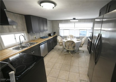 Welcome to Tamiami Village, a vibrant 55+ pet-friendly community on Six Lakes Country Club in Florida - for sale on GolfHomes.com, golf home, golf lot