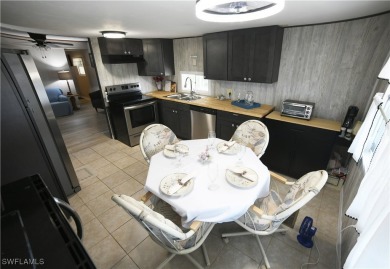 Welcome to Tamiami Village, a vibrant 55+ pet-friendly community on Six Lakes Country Club in Florida - for sale on GolfHomes.com, golf home, golf lot