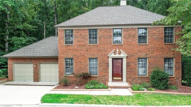 105 Quarterpath Court is a two-story, detached townhome located on Jamestown Park Golf Course in North Carolina - for sale on GolfHomes.com, golf home, golf lot