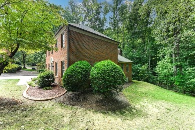 105 Quarterpath Court is a two-story, detached townhome located on Jamestown Park Golf Course in North Carolina - for sale on GolfHomes.com, golf home, golf lot