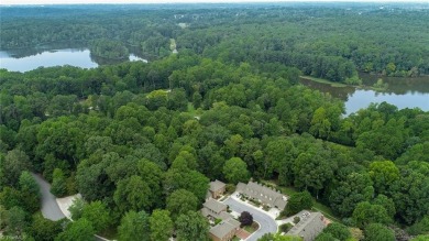 105 Quarterpath Court is a two-story, detached townhome located on Jamestown Park Golf Course in North Carolina - for sale on GolfHomes.com, golf home, golf lot