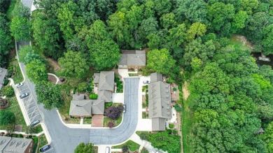 105 Quarterpath Court is a two-story, detached townhome located on Jamestown Park Golf Course in North Carolina - for sale on GolfHomes.com, golf home, golf lot