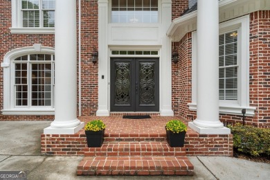 Experience luxury living at its finest in this stunning on Alpharetta Athletic Club East in Georgia - for sale on GolfHomes.com, golf home, golf lot