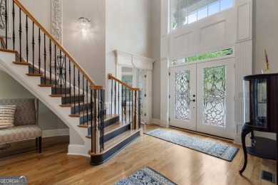 Experience luxury living at its finest in this stunning on Alpharetta Athletic Club East in Georgia - for sale on GolfHomes.com, golf home, golf lot