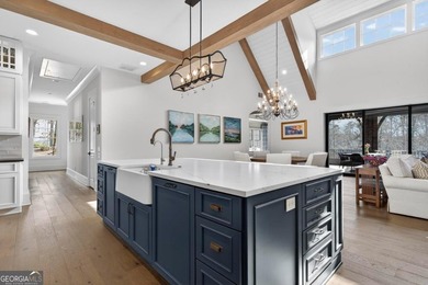 Welcome to this beautiful custom-built, 4-bedroom, 4.5-bath lake on Reynolds Lake Oconee - The Oconee in Georgia - for sale on GolfHomes.com, golf home, golf lot