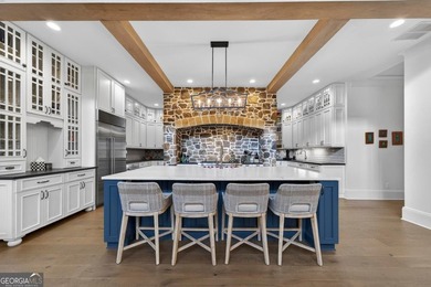 Welcome to this beautiful custom-built, 4-bedroom, 4.5-bath lake on Reynolds Lake Oconee - The Oconee in Georgia - for sale on GolfHomes.com, golf home, golf lot