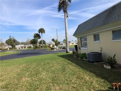 Enjoy a GOLF-COURSE VIEW from the privacy of your screened-in on Lehigh Resort Club in Florida - for sale on GolfHomes.com, golf home, golf lot