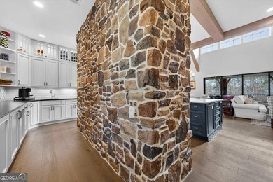 Welcome to this beautiful custom-built, 4-bedroom, 4.5-bath lake on Reynolds Lake Oconee - The Oconee in Georgia - for sale on GolfHomes.com, golf home, golf lot