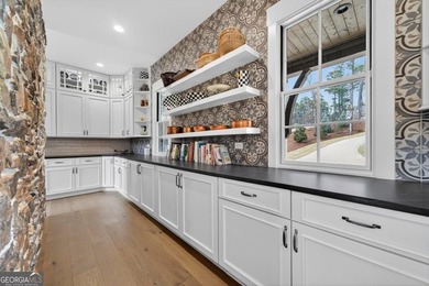 Welcome to this beautiful custom-built, 4-bedroom, 4.5-bath lake on Reynolds Lake Oconee - The Oconee in Georgia - for sale on GolfHomes.com, golf home, golf lot