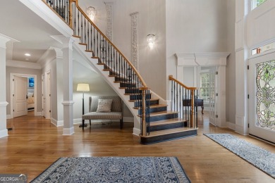 Experience luxury living at its finest in this stunning on Alpharetta Athletic Club East in Georgia - for sale on GolfHomes.com, golf home, golf lot