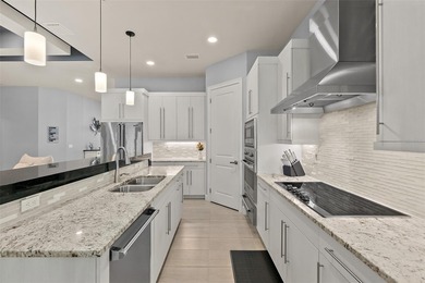 Welcome to this beautifully appointed 3-bedroom, 2-bath home on Plantation Bay Golf and Country Club in Florida - for sale on GolfHomes.com, golf home, golf lot