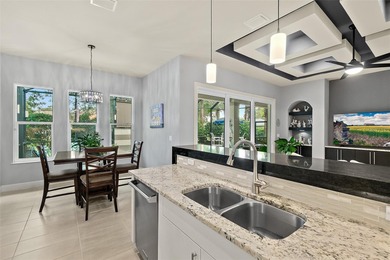 Welcome to this beautifully appointed 3-bedroom, 2-bath home on Plantation Bay Golf and Country Club in Florida - for sale on GolfHomes.com, golf home, golf lot