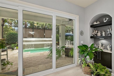 Welcome to this beautifully appointed 3-bedroom, 2-bath home on Plantation Bay Golf and Country Club in Florida - for sale on GolfHomes.com, golf home, golf lot