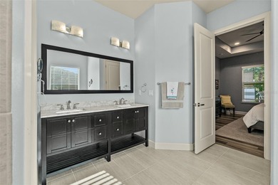 Welcome to this beautifully appointed 3-bedroom, 2-bath home on Plantation Bay Golf and Country Club in Florida - for sale on GolfHomes.com, golf home, golf lot