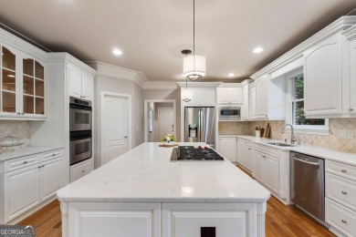 Experience luxury living at its finest in this stunning on Alpharetta Athletic Club East in Georgia - for sale on GolfHomes.com, golf home, golf lot