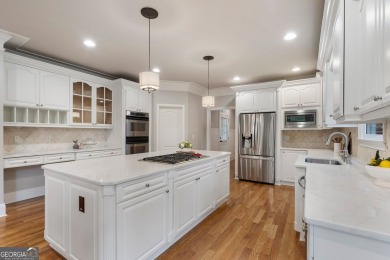 Experience luxury living at its finest in this stunning on Alpharetta Athletic Club East in Georgia - for sale on GolfHomes.com, golf home, golf lot