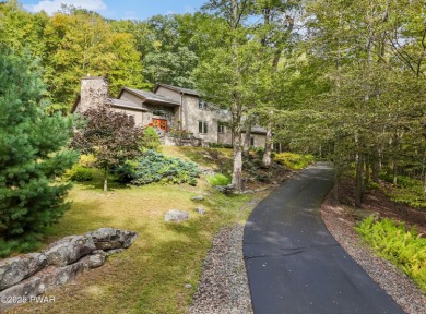 Set on 1.46 acres in Tanglwood Lakes, this 3,310-SF PRIVATE on Paupack Hills Golf and Country Club in Pennsylvania - for sale on GolfHomes.com, golf home, golf lot