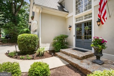 Tucked into a quiet cul-de-sac in sought-after Windward, this on The Golf Club of Georgia in Georgia - for sale on GolfHomes.com, golf home, golf lot