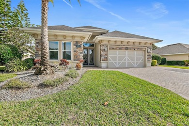 Welcome to this beautifully appointed 3-bedroom, 2-bath home on Plantation Bay Golf and Country Club in Florida - for sale on GolfHomes.com, golf home, golf lot