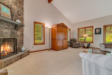 Set on 1.46 acres in Tanglwood Lakes, this 3,310-SF PRIVATE on Paupack Hills Golf and Country Club in Pennsylvania - for sale on GolfHomes.com, golf home, golf lot