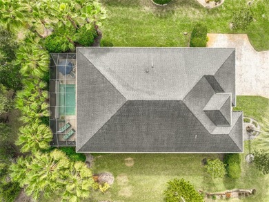 Welcome to this beautifully appointed 3-bedroom, 2-bath home on Plantation Bay Golf and Country Club in Florida - for sale on GolfHomes.com, golf home, golf lot