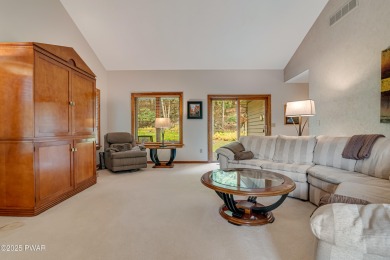 Set on 1.46 acres in Tanglwood Lakes, this 3,310-SF PRIVATE on Paupack Hills Golf and Country Club in Pennsylvania - for sale on GolfHomes.com, golf home, golf lot