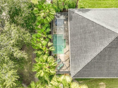 Welcome to this beautifully appointed 3-bedroom, 2-bath home on Plantation Bay Golf and Country Club in Florida - for sale on GolfHomes.com, golf home, golf lot