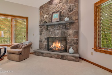 Set on 1.46 acres in Tanglwood Lakes, this 3,310-SF PRIVATE on Paupack Hills Golf and Country Club in Pennsylvania - for sale on GolfHomes.com, golf home, golf lot