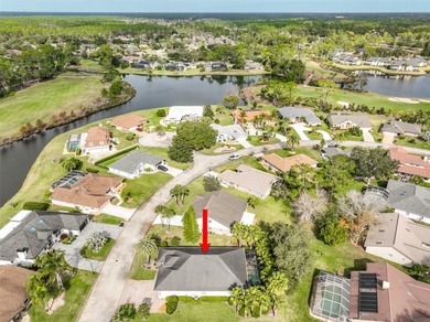 Welcome to this beautifully appointed 3-bedroom, 2-bath home on Plantation Bay Golf and Country Club in Florida - for sale on GolfHomes.com, golf home, golf lot