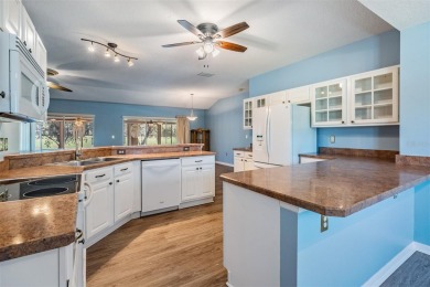 This *Laguna* model features an open floor plan with over 1,759 on Tampa Bay Golf and Country Club in Florida - for sale on GolfHomes.com, golf home, golf lot