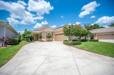 THIS POPULAR DORCHESTER plan home in the Laurel Glen community on Grasslands Golf and Country Club in Florida - for sale on GolfHomes.com, golf home, golf lot