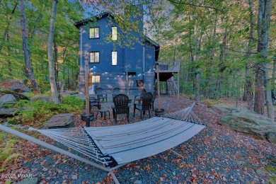 Discover the perfect blend of comfort and serenity in this on The Hideout Golf in Pennsylvania - for sale on GolfHomes.com, golf home, golf lot