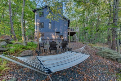 Discover the perfect blend of comfort and serenity in this on The Hideout Golf in Pennsylvania - for sale on GolfHomes.com, golf home, golf lot