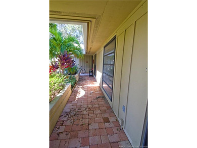 Discover the active golfing community of Eaglewood in Hobe Sound on Eagle Wood Golf Course in Florida - for sale on GolfHomes.com, golf home, golf lot