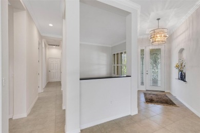 THIS POPULAR DORCHESTER plan home in the Laurel Glen community on Grasslands Golf and Country Club in Florida - for sale on GolfHomes.com, golf home, golf lot