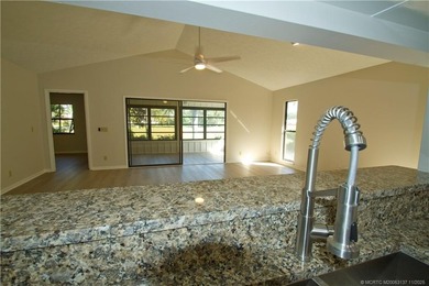 Discover the active golfing community of Eaglewood in Hobe Sound on Eagle Wood Golf Course in Florida - for sale on GolfHomes.com, golf home, golf lot