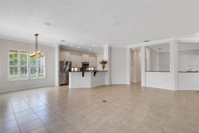 THIS POPULAR DORCHESTER plan home in the Laurel Glen community on Grasslands Golf and Country Club in Florida - for sale on GolfHomes.com, golf home, golf lot