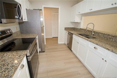 Discover the active golfing community of Eaglewood in Hobe Sound on Eagle Wood Golf Course in Florida - for sale on GolfHomes.com, golf home, golf lot