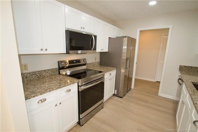 Discover the active golfing community of Eaglewood in Hobe Sound on Eagle Wood Golf Course in Florida - for sale on GolfHomes.com, golf home, golf lot