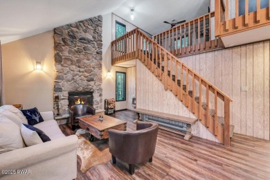 Discover the perfect blend of comfort and serenity in this on The Hideout Golf in Pennsylvania - for sale on GolfHomes.com, golf home, golf lot