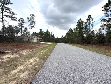 Located in the homes-only community of Citrus Springs, this on Pine Ridge Community Golf and Country Club in Florida - for sale on GolfHomes.com, golf home, golf lot